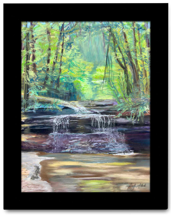 A giclee print of Creation Falls in Red River Gorge in a thick black frame.