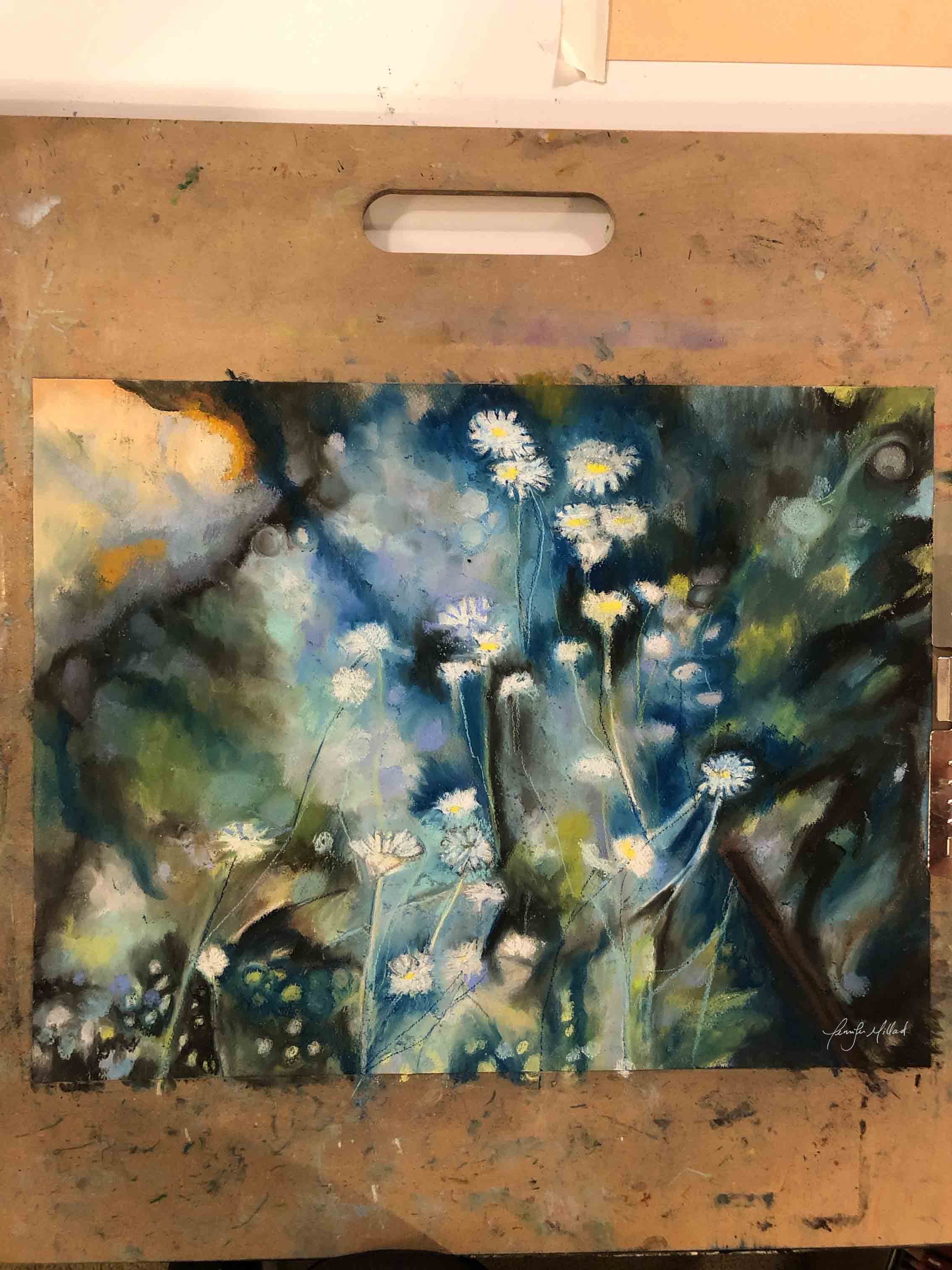 A photo of this soft pastel of abstract asters right after completion.