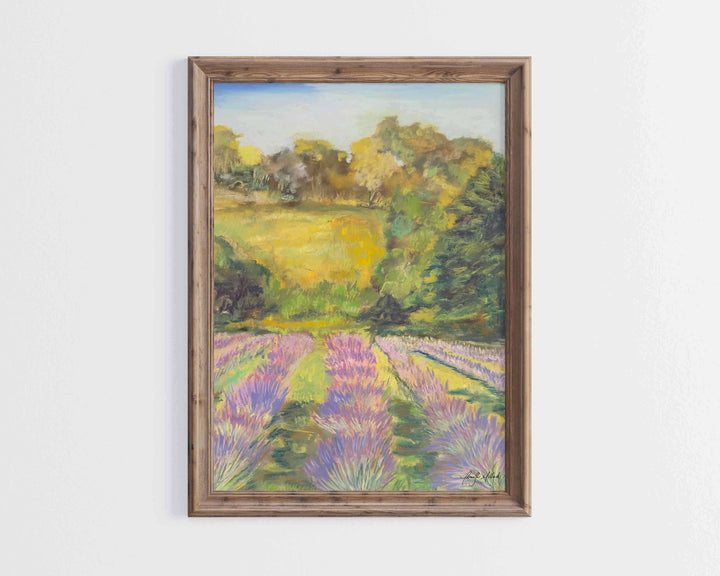 A soft pastel painting of a lavender farm in a darker wood frame.