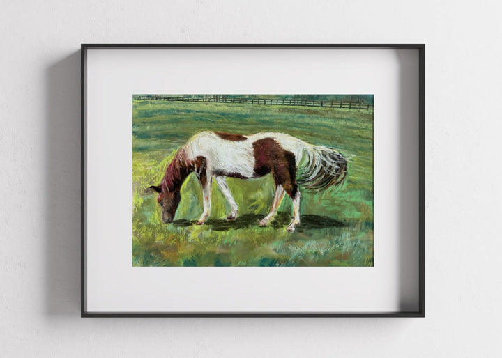 Fine art print of a spring horse in a white mat and black frame.